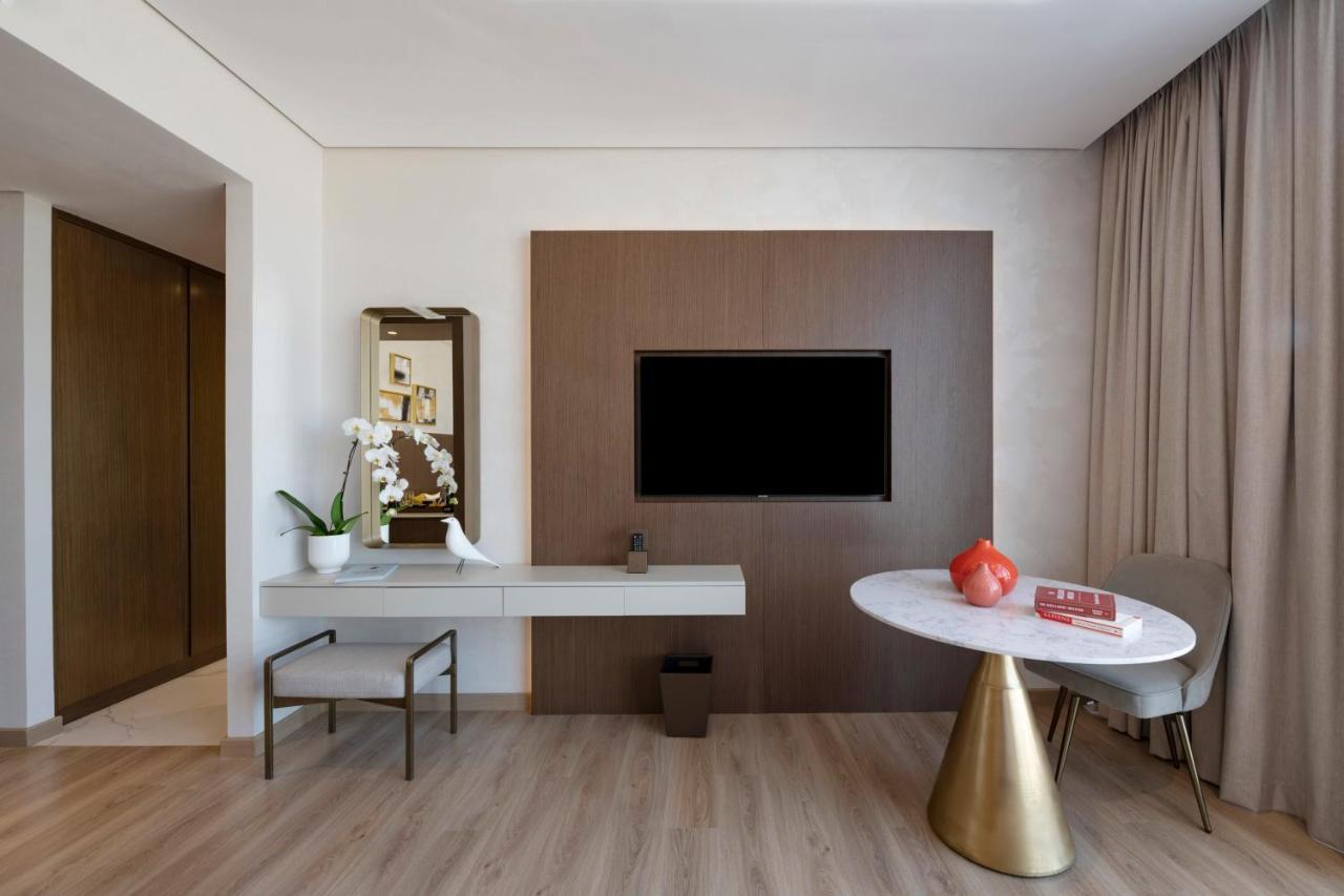 Movenpick Jumeirah Village Triangle Dubai Ngoại thất bức ảnh A room at the hotel