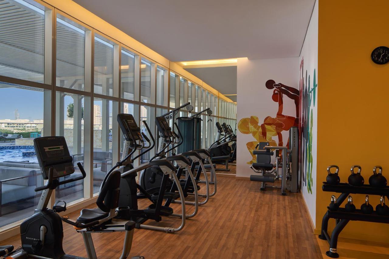 Movenpick Jumeirah Village Triangle Dubai Ngoại thất bức ảnh The gym at the hotel