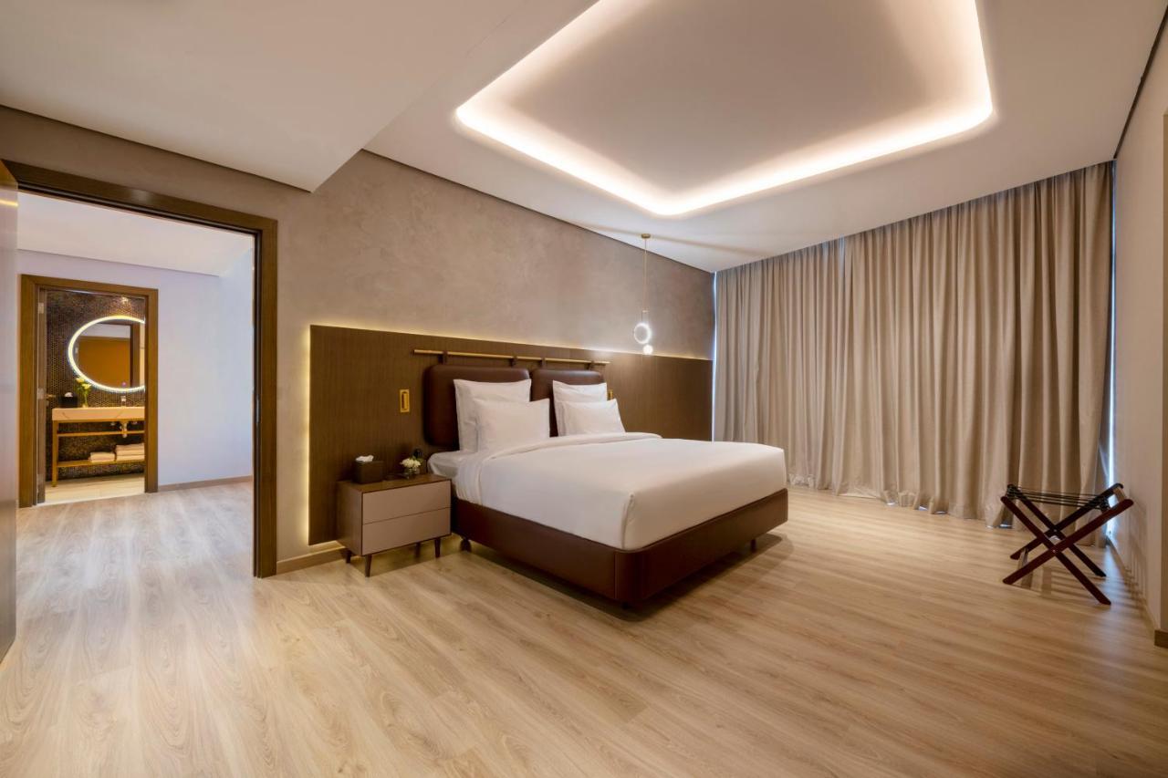 Movenpick Jumeirah Village Triangle Dubai Ngoại thất bức ảnh Suite