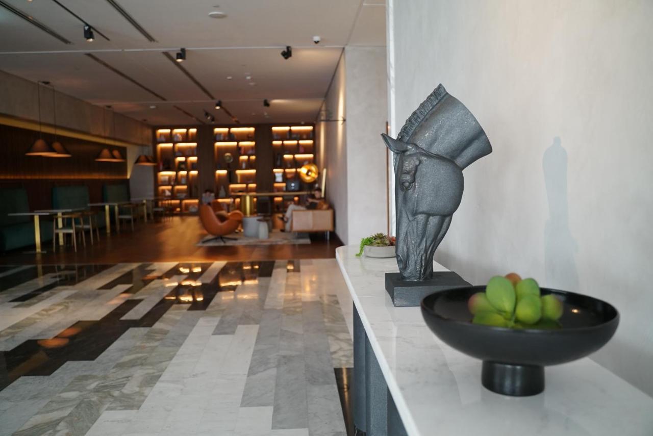 Movenpick Jumeirah Village Triangle Dubai Ngoại thất bức ảnh The interior of the lounge