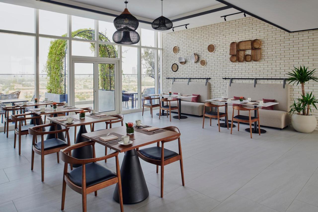 Movenpick Jumeirah Village Triangle Dubai Ngoại thất bức ảnh Restaurant