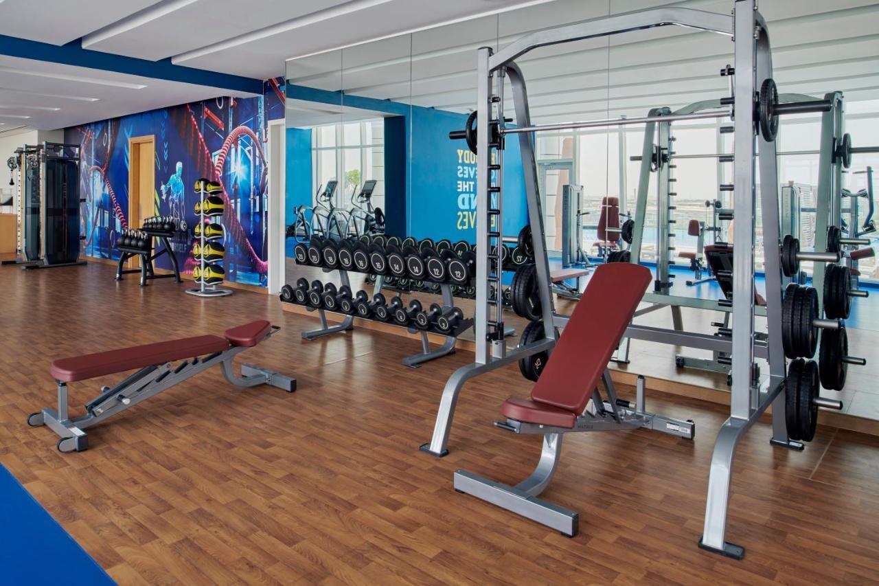 Movenpick Jumeirah Village Triangle Dubai Ngoại thất bức ảnh A modern gym