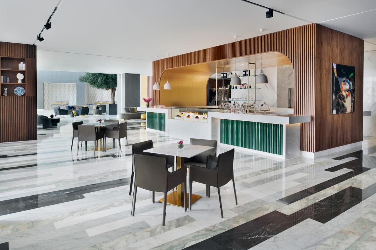 Movenpick Jumeirah Village Triangle Dubai Ngoại thất bức ảnh Interior of the hotel