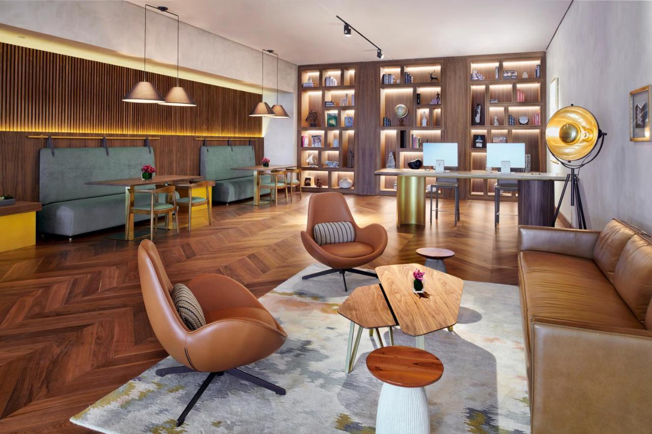 Movenpick Jumeirah Village Triangle Dubai Ngoại thất bức ảnh The Library at The Hari