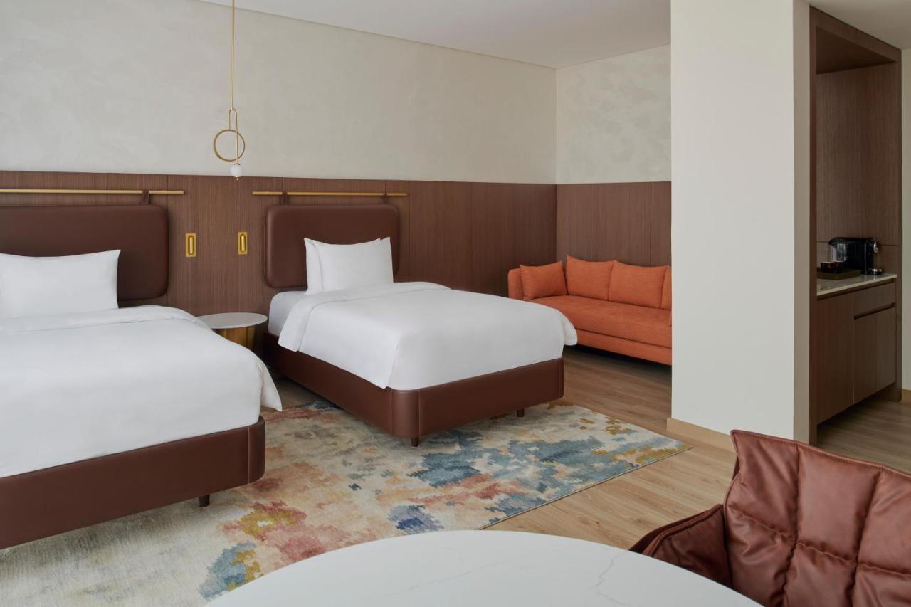 Movenpick Jumeirah Village Triangle Dubai Ngoại thất bức ảnh A room at the hotel